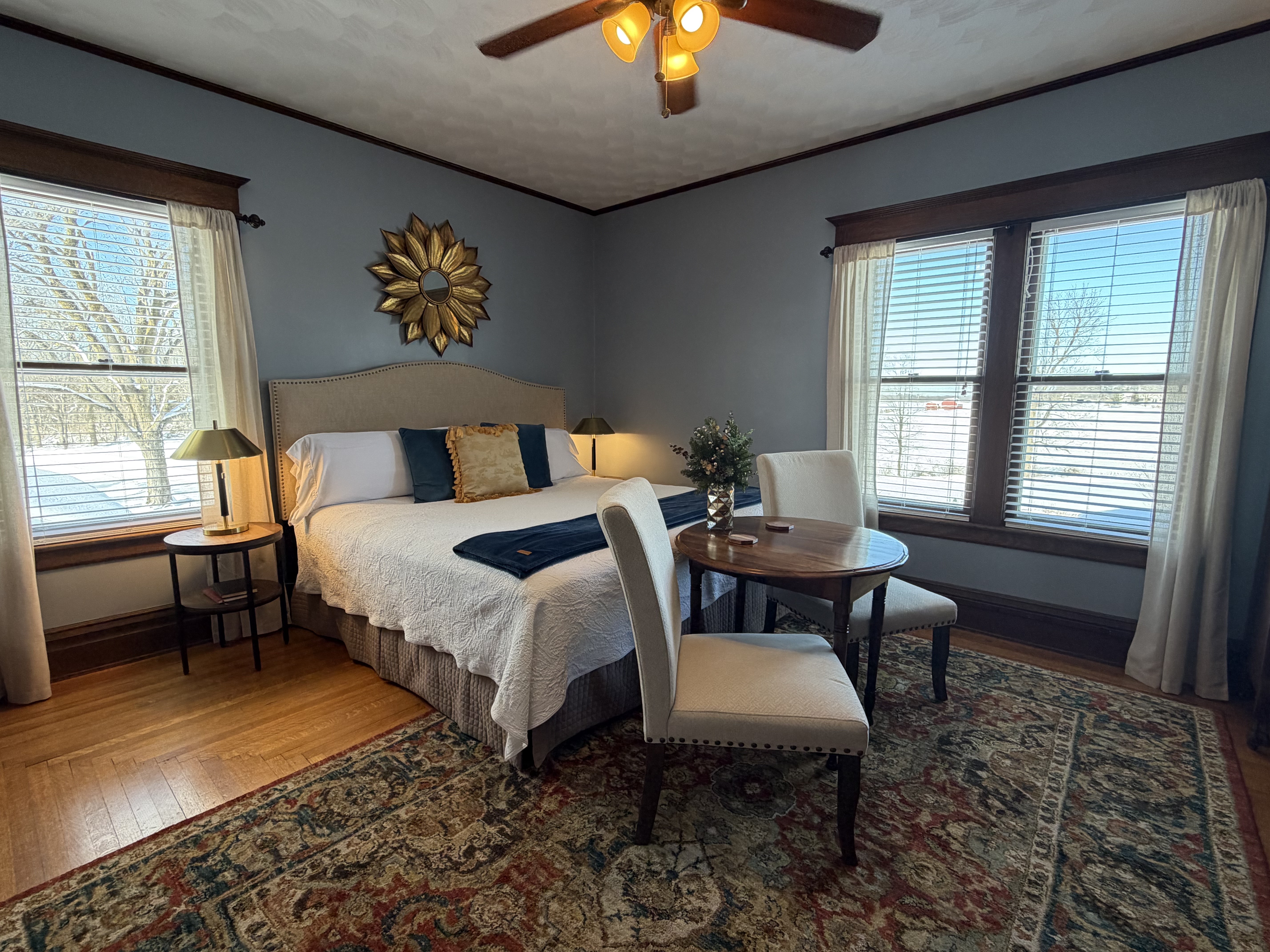 Largest Suite with king bed, table/chairs, original oak floors & trim