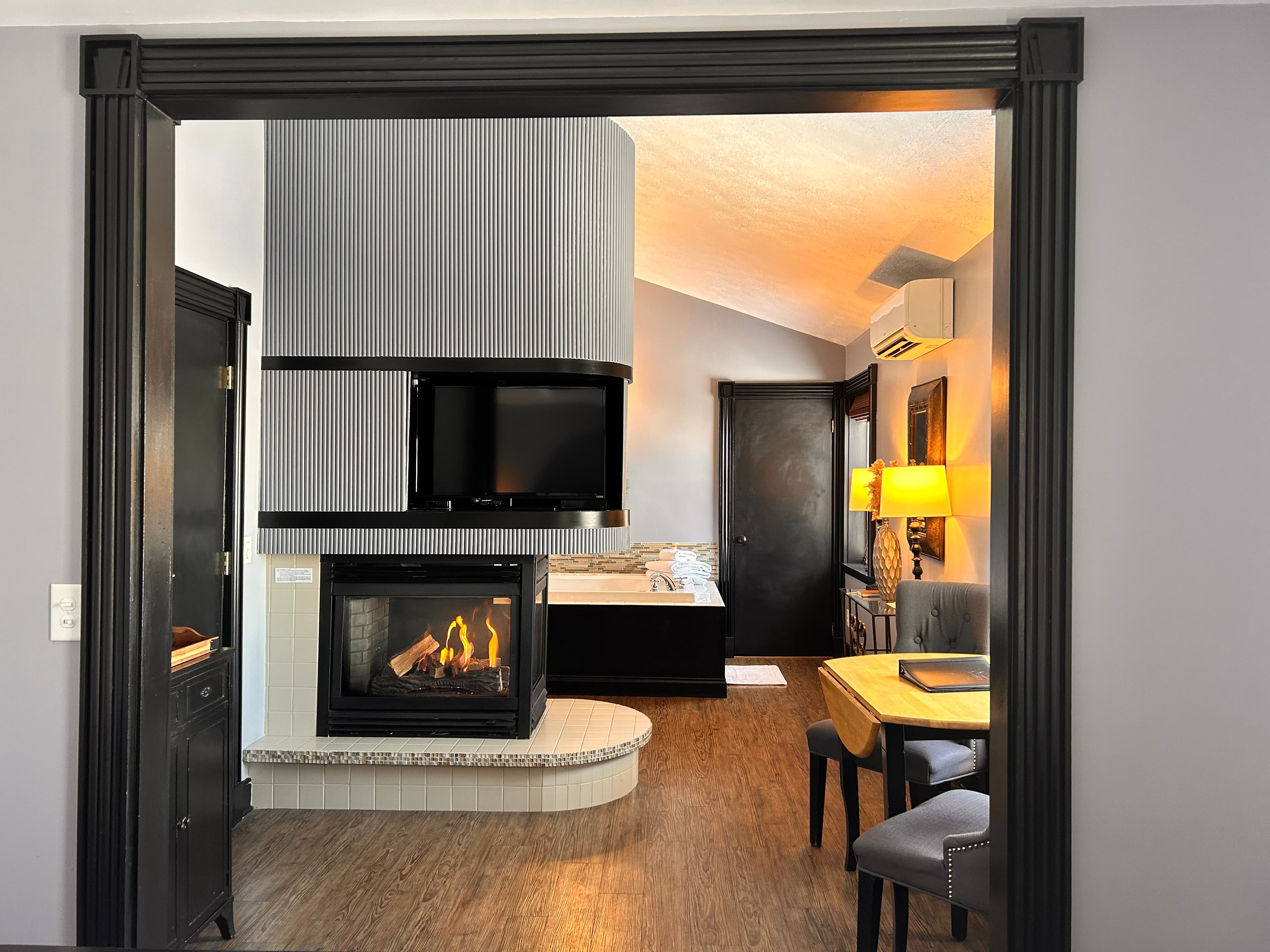 Suite with Jetted Tub for two people, Fireplace, and Sitting Area