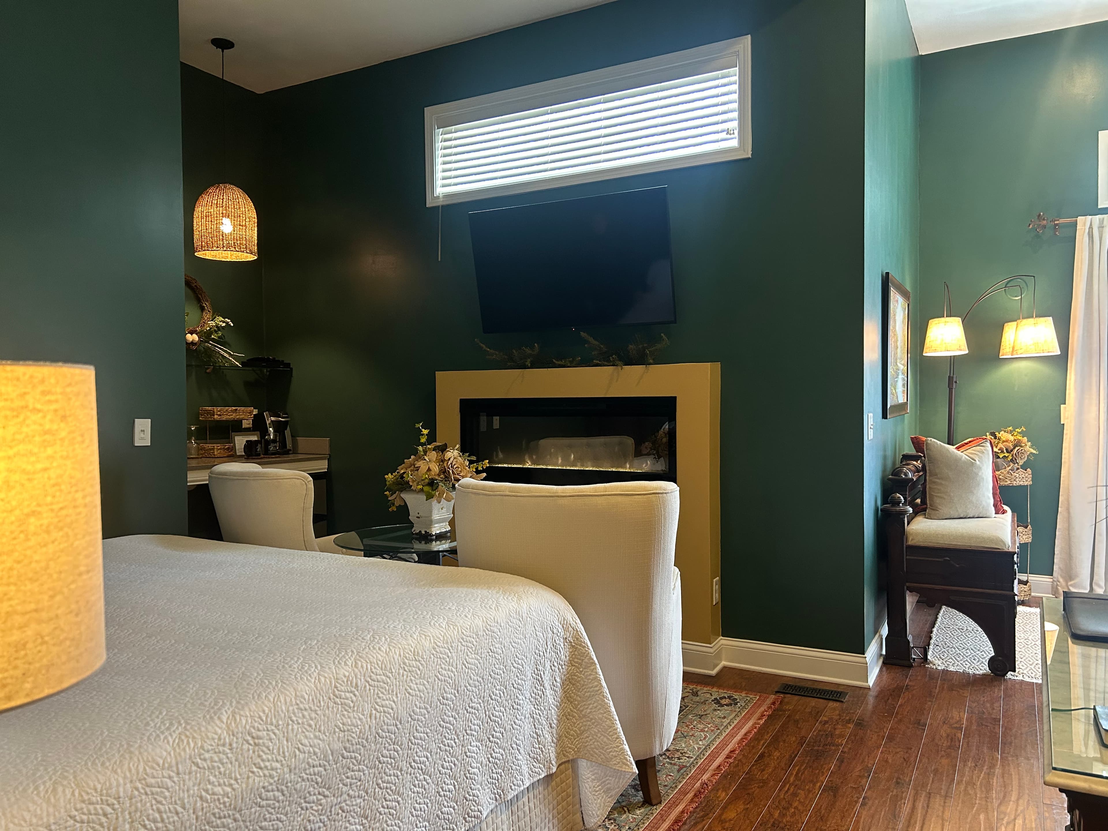 Ensuite Bath, fireplace, television, robes and 2 person walk-in shower.