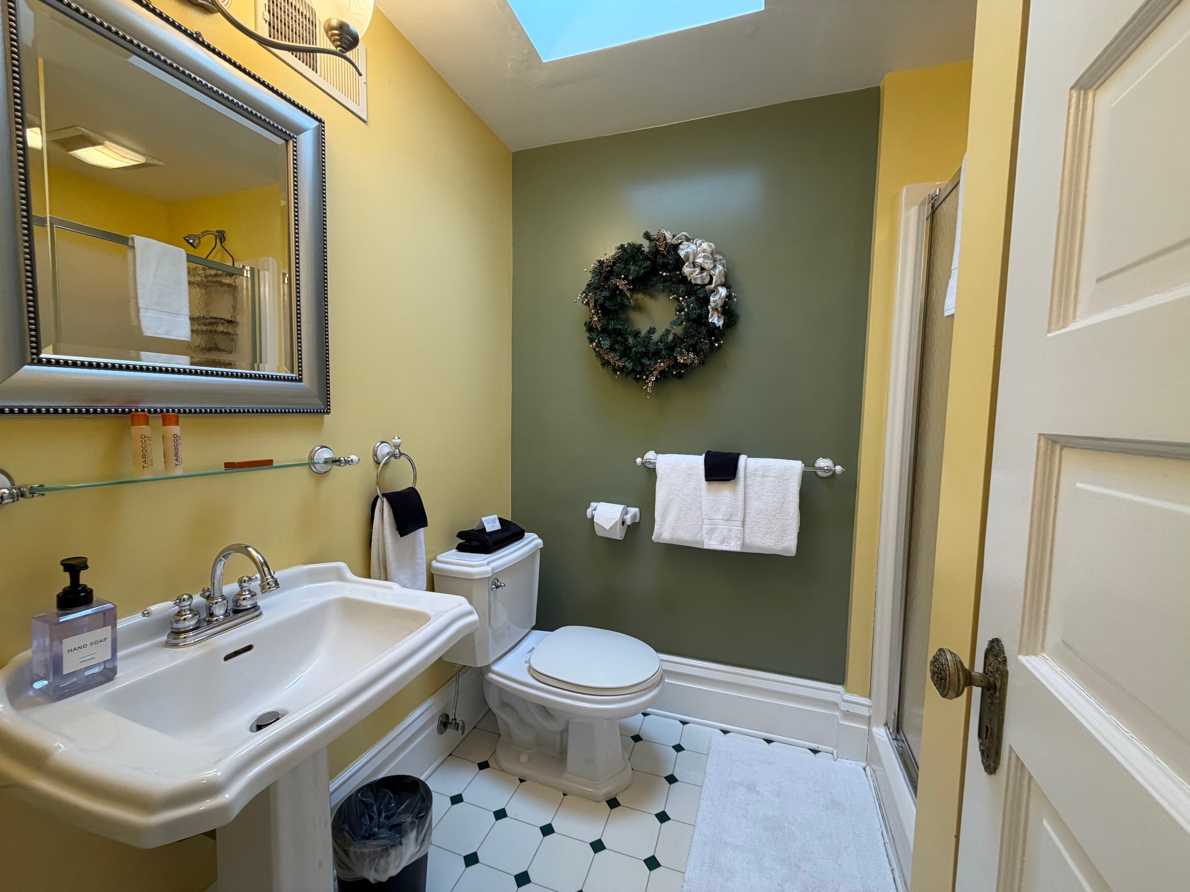 Ensuite bath with shower and pedestal sink