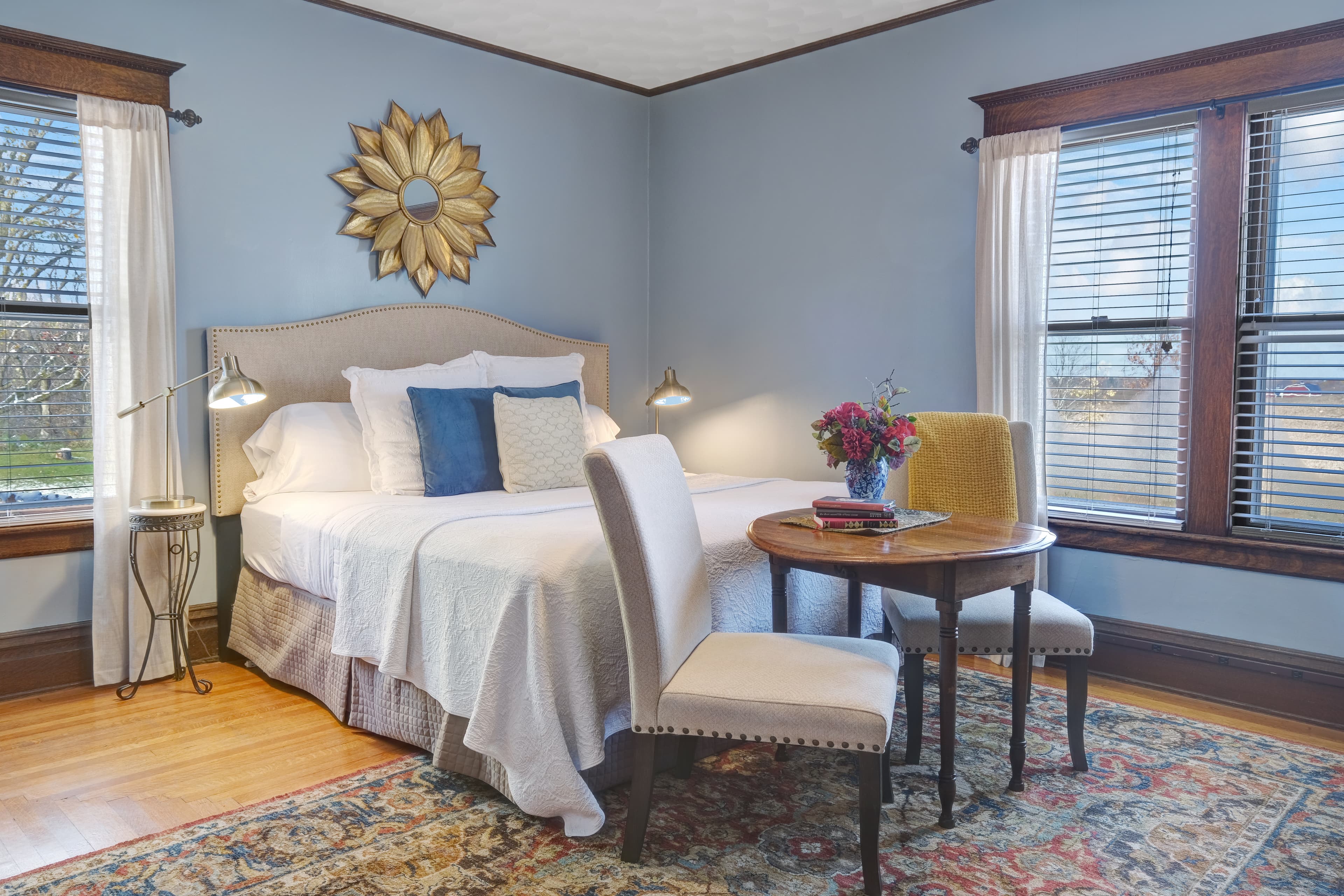 Largest Suite with king bed, table/chairs, original oak floors & trim