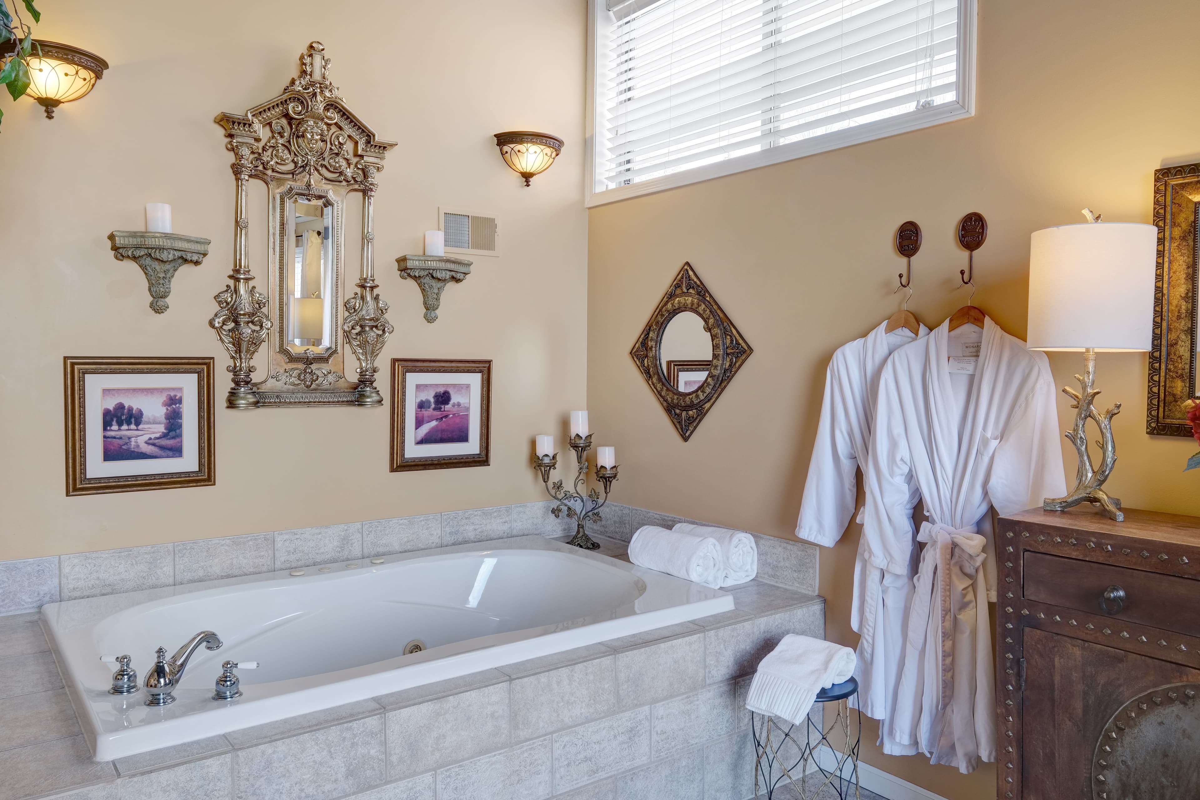 Two person jetted tub, complimentary use of robes.