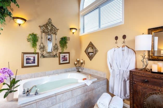 Two person jetted tub, complimentary use of robes.