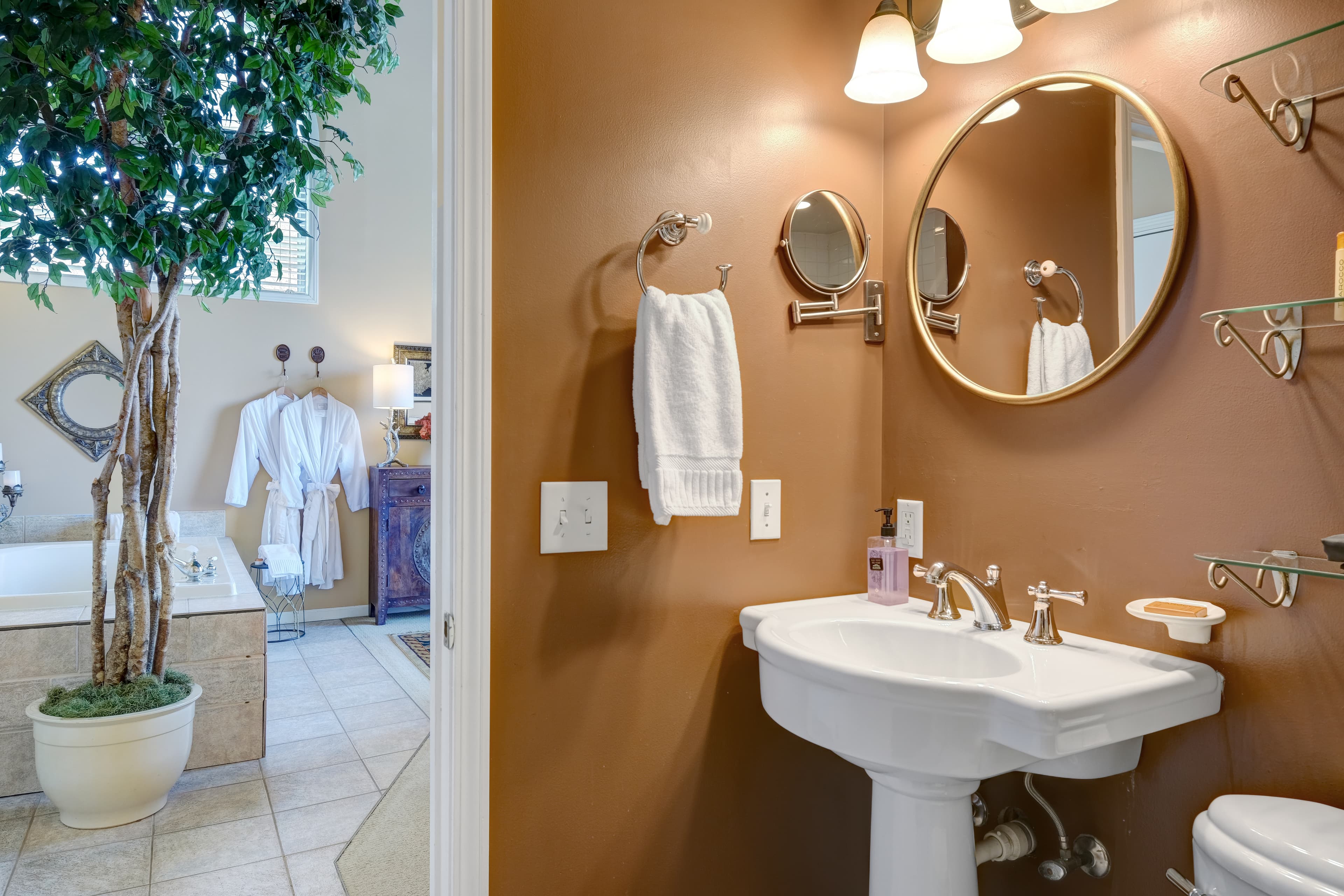 Suite with ensuite bath with two person jetted tub and two person shower.