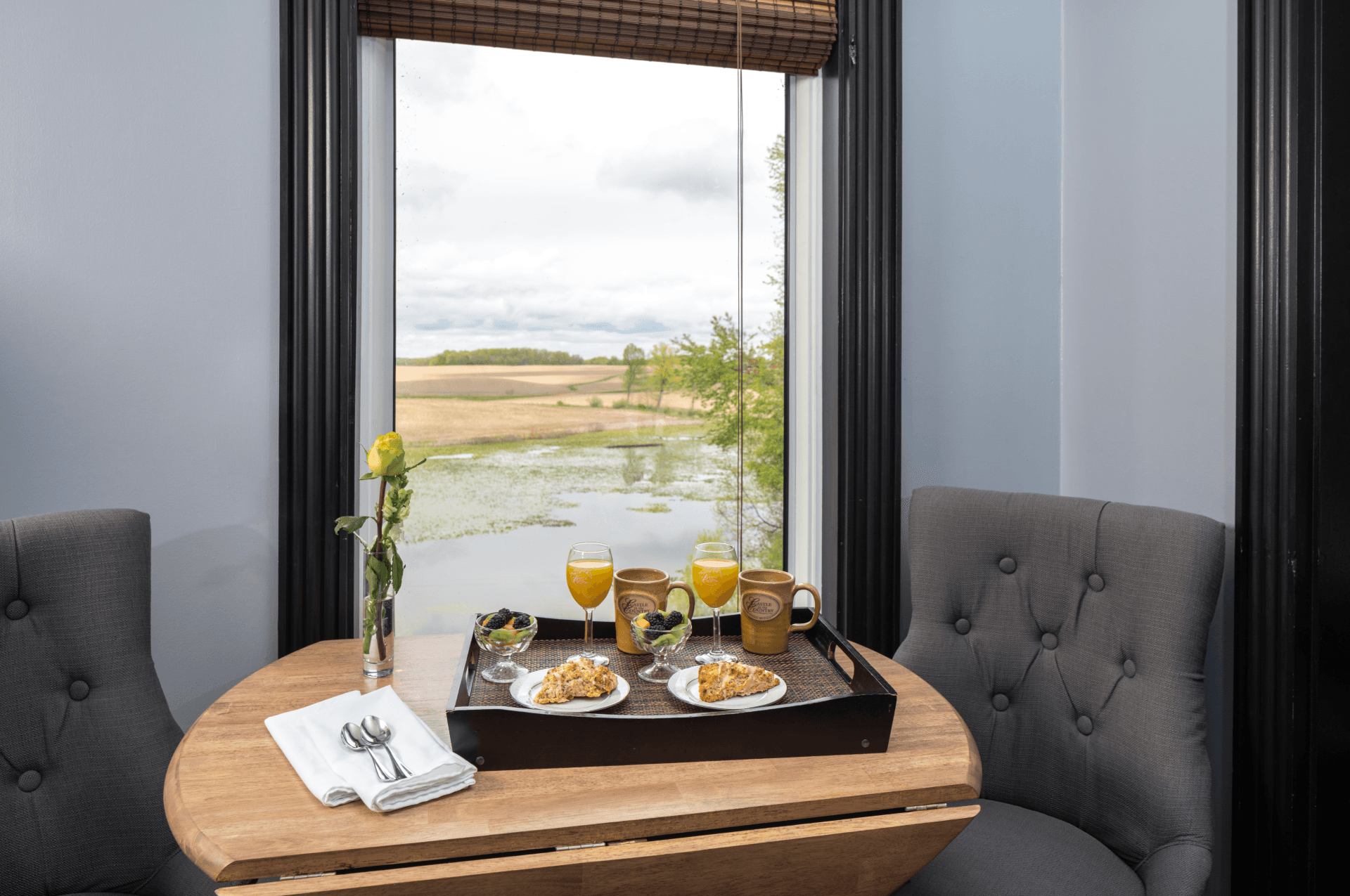 Breakfast tray for two by a countryside window view in the Sir Lancelot Suite at Castle in the Country.