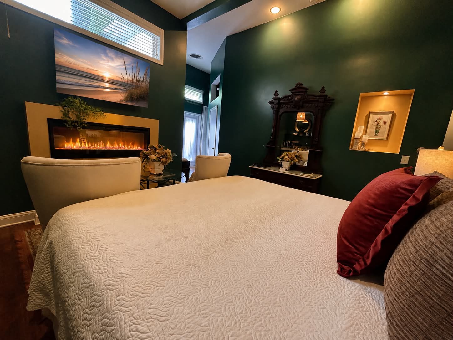 Ensuite Bath, fireplace, television, robes and 2 person walk-in shower.