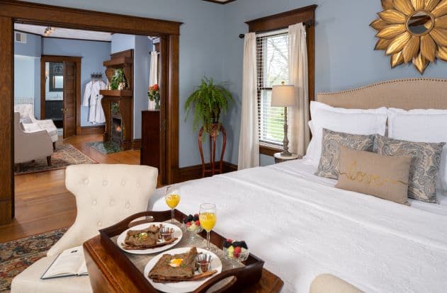 Largest Suite with king bed, table/chairs, original oak floors & trim