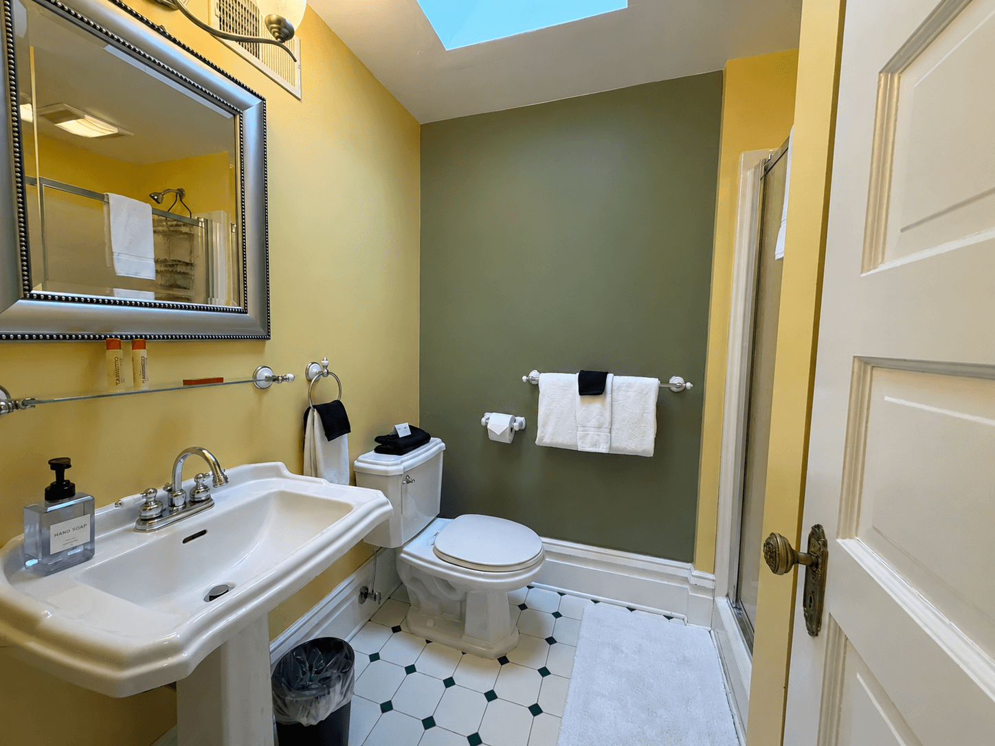 Ensuite bath with shower and pedestal sink