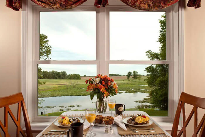 Set table in the dining room overlooking the natural pond