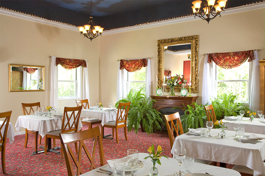 Dining room with individual tables for two