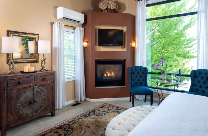 King Arthur Room with Fireplace, Flatscreen, and Large Window