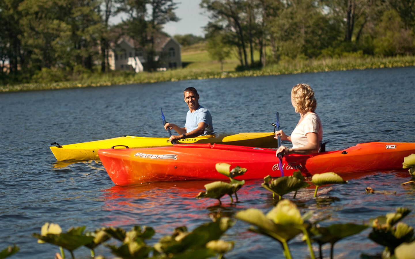 Couple kayaking on the lake