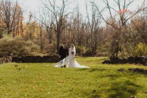 wedding couple in spring with green grass