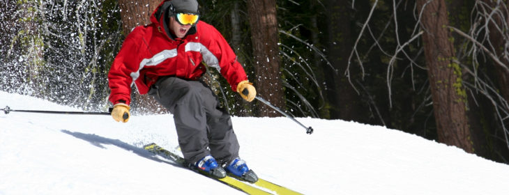Man snow skiing downhill
