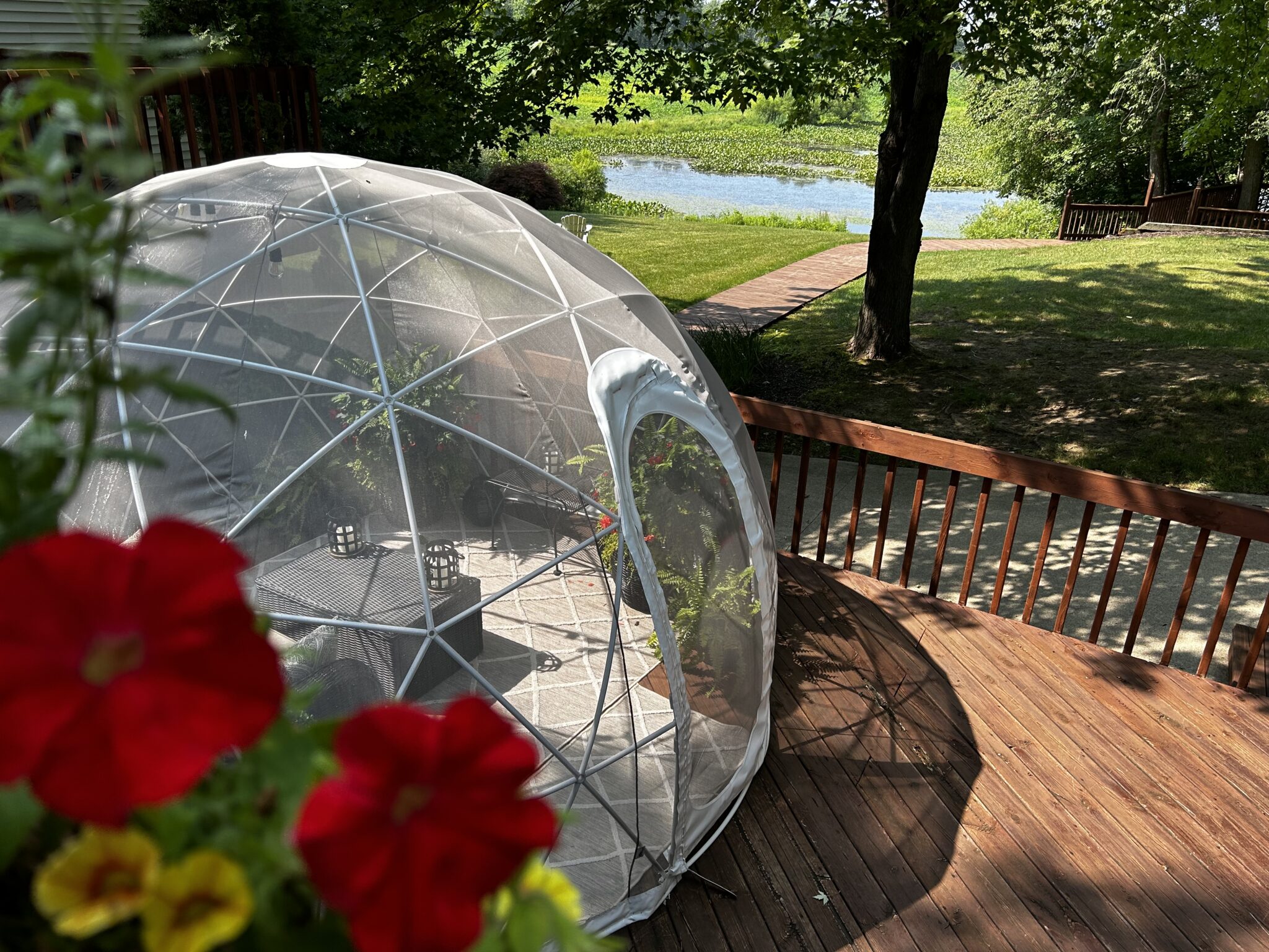 Garden dome igloo located on the deck of the Castle Keep building overlooking the pond